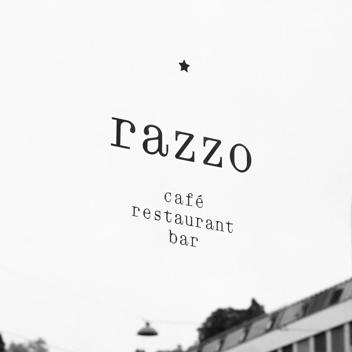 Black text on a white background that reads 'razzo' with a small star above and 'café restaurant bar' below.