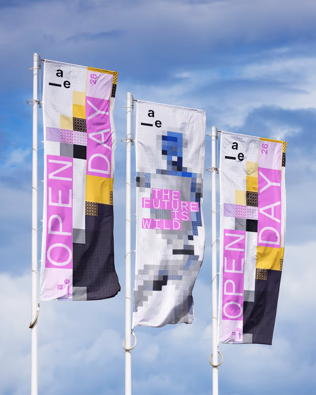 Three flags with pixelated designs and text: OPEN DAY 26, THE FUTURE IS WILD, against a cloudy sky.